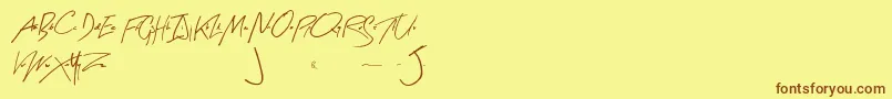 Шрифт ArtySignature – коричневые шрифты на жёлтом фоне