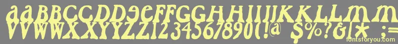 Caslondadaesque Font – Yellow Fonts on Gray Background