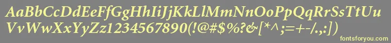 MiniaturecBolditalic-fontti – keltaiset fontit harmaalla taustalla