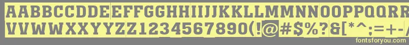 AMonumentotitulsl Font – Yellow Fonts on Gray Background