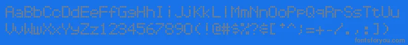 Repetitionscrolling-fontti – harmaat kirjasimet sinisellä taustalla