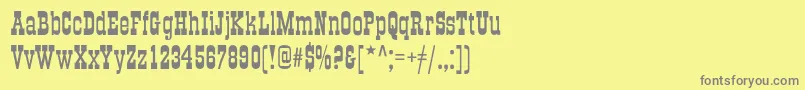 フォントGradc – 黄色の背景に灰色の文字