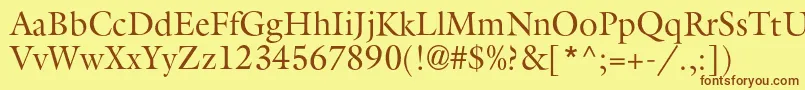 フォントAggalleonc – 茶色の文字が黄色の背景にあります。