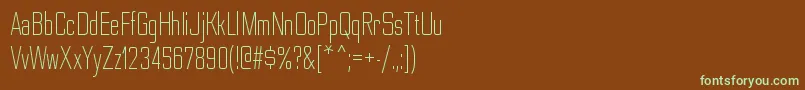 フォントNesobritecdltRegular – 緑色の文字が茶色の背景にあります。