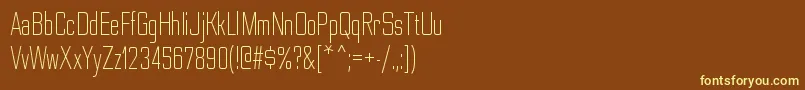 NesobritecdltRegular-fontti – keltaiset fontit ruskealla taustalla