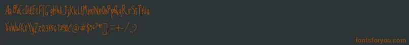 Mfooont Font – Brown Fonts on Black Background