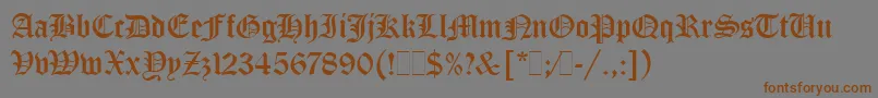 フォントOldEnglishLetPlain.1.0 – 茶色の文字が灰色の背景にあります。