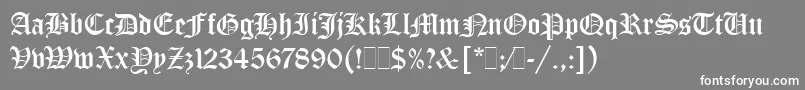 OldEnglishLetPlain.1.0-fontti – valkoiset fontit harmaalla taustalla