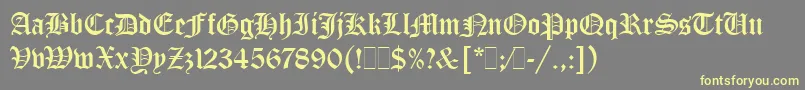 Czcionka OldEnglishLetPlain.1.0 – żółte czcionki na szarym tle