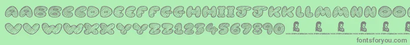 CartoonMadness Font – Gray Fonts on Green Background