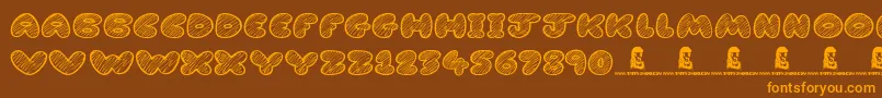 CartoonMadness Font – Orange Fonts on Brown Background