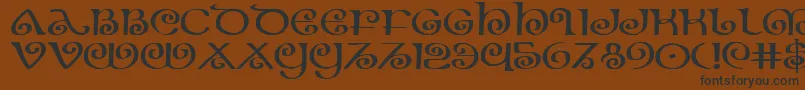 Theshireexp Font – Black Fonts on Brown Background