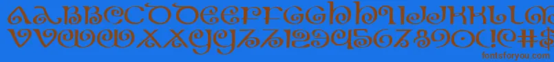 フォントTheshireexp – 茶色の文字が青い背景にあります。