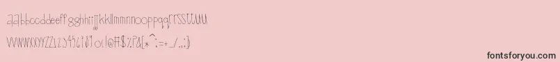 Scrapbuckets-Schriftart – Schwarze Schriften auf rosa Hintergrund