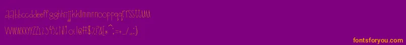 Scrapbuckets Font – Orange Fonts on Purple Background