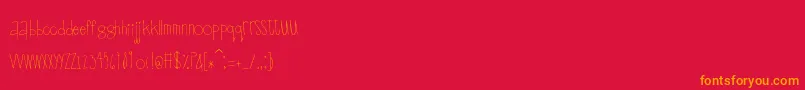 Scrapbuckets Font – Orange Fonts on Red Background