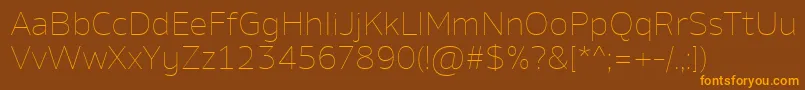 AminoThin-Schriftart – Orangefarbene Schriften auf braunem Hintergrund