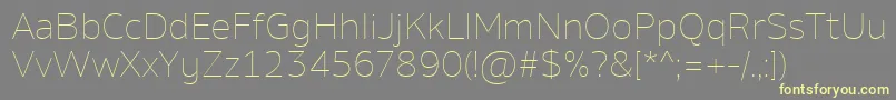 AminoThin-Schriftart – Gelbe Schriften auf grauem Hintergrund