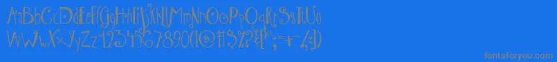 AustieBostWibbly Font – Gray Fonts on Blue Background