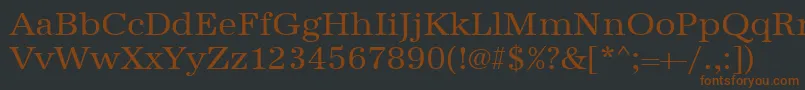 Urwantiquatwid-fontti – ruskeat fontit mustalla taustalla