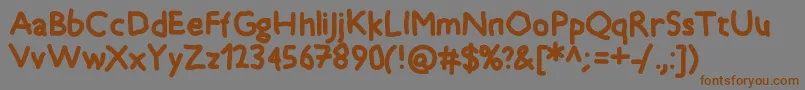 フォントTimkid – 茶色の文字が灰色の背景にあります。