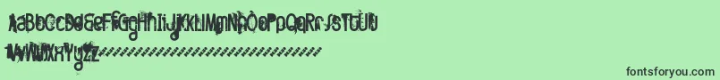 フォントFttwod – 緑の背景に黒い文字