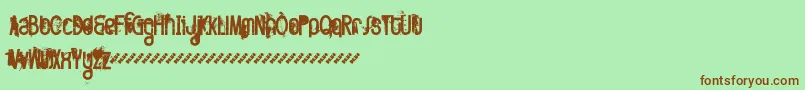 Fttwod Font – Brown Fonts on Green Background