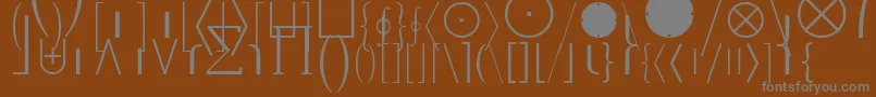 MathExtensionsA-fontti – harmaat kirjasimet ruskealla taustalla
