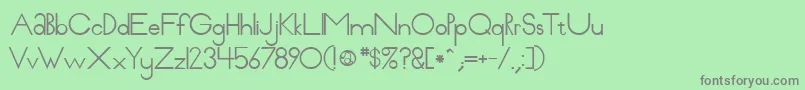 Pabloco Font – Gray Fonts on Green Background