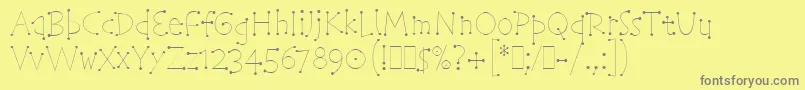 フォントTelegramLetPlain.1.0 – 黄色の背景に灰色の文字