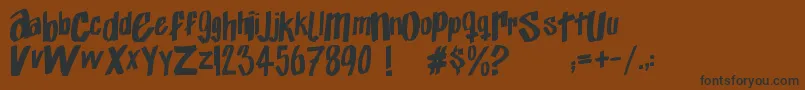 Шрифт Exito – чёрные шрифты на коричневом фоне