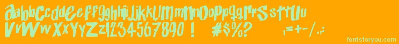 Exito-Schriftart – Grüne Schriften auf orangefarbenem Hintergrund