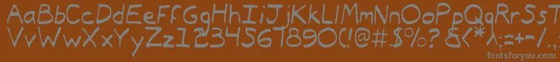 Typee2l Font – Gray Fonts on Brown Background