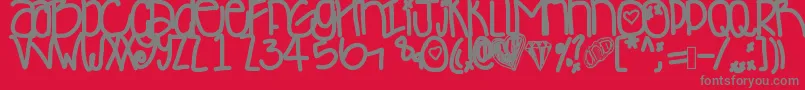 Desyminicakes Font – Gray Fonts on Red Background