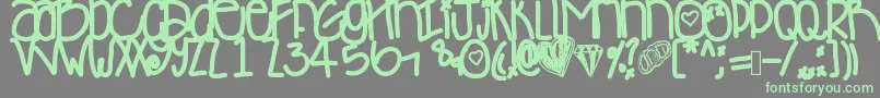 Desyminicakes Font – Green Fonts on Gray Background
