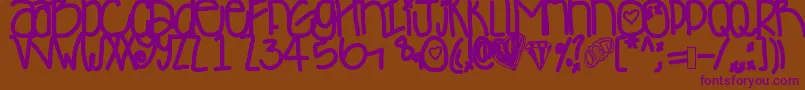 Desyminicakes Font – Purple Fonts on Brown Background