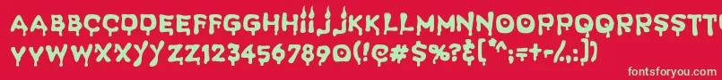SpookyLight-Schriftart – Grüne Schriften auf rotem Hintergrund
