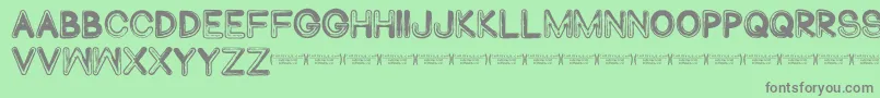 Abduco Font – Gray Fonts on Green Background