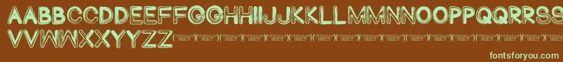 Abduco Font – Green Fonts on Brown Background