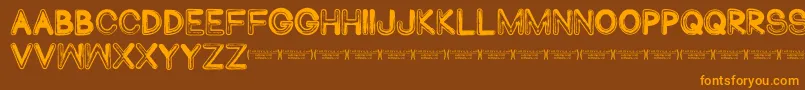 Abduco Font – Orange Fonts on Brown Background