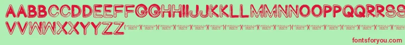 Abduco Font – Red Fonts on Green Background