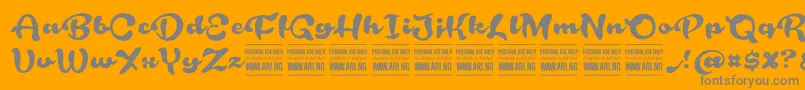 Więcej informacji o czcionce RoughrakooninPersonal Czcionka RoughrakooninPersonal – szare czcionki na pomarańczowym tle