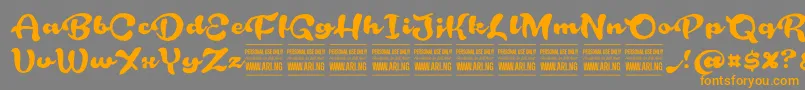 RoughrakooninPersonal Font – Orange Fonts on Gray Background