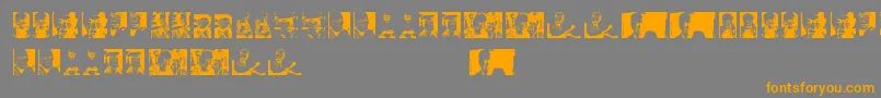 フォントToer – オレンジの文字は灰色の背景にあります。