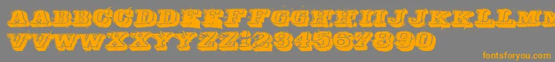 フォントDepraved – オレンジの文字は灰色の背景にあります。