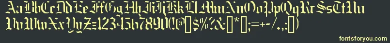 Nakdmonk Font – Yellow Fonts on Black Background