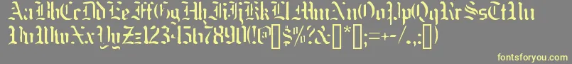 Nakdmonk Font – Yellow Fonts on Gray Background