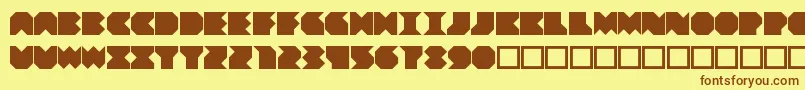 フォントBeuve – 茶色の文字が黄色の背景にあります。