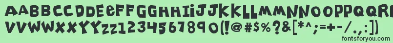 K26clippitysnippity Font – Black Fonts on Green Background
