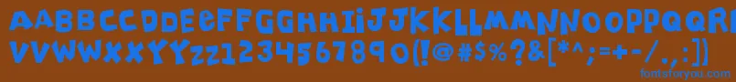 K26clippitysnippity Font – Blue Fonts on Brown Background